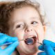 How Pediatric Dentists Treat New Decay Around An Existing Baby Tooth Crown
