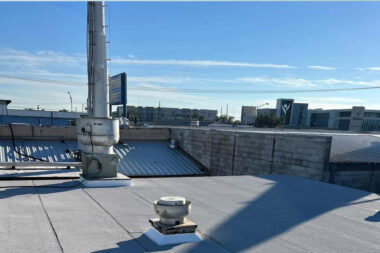 How Rooftop Equipment and Building Operations Influence Commercial Roof Performance